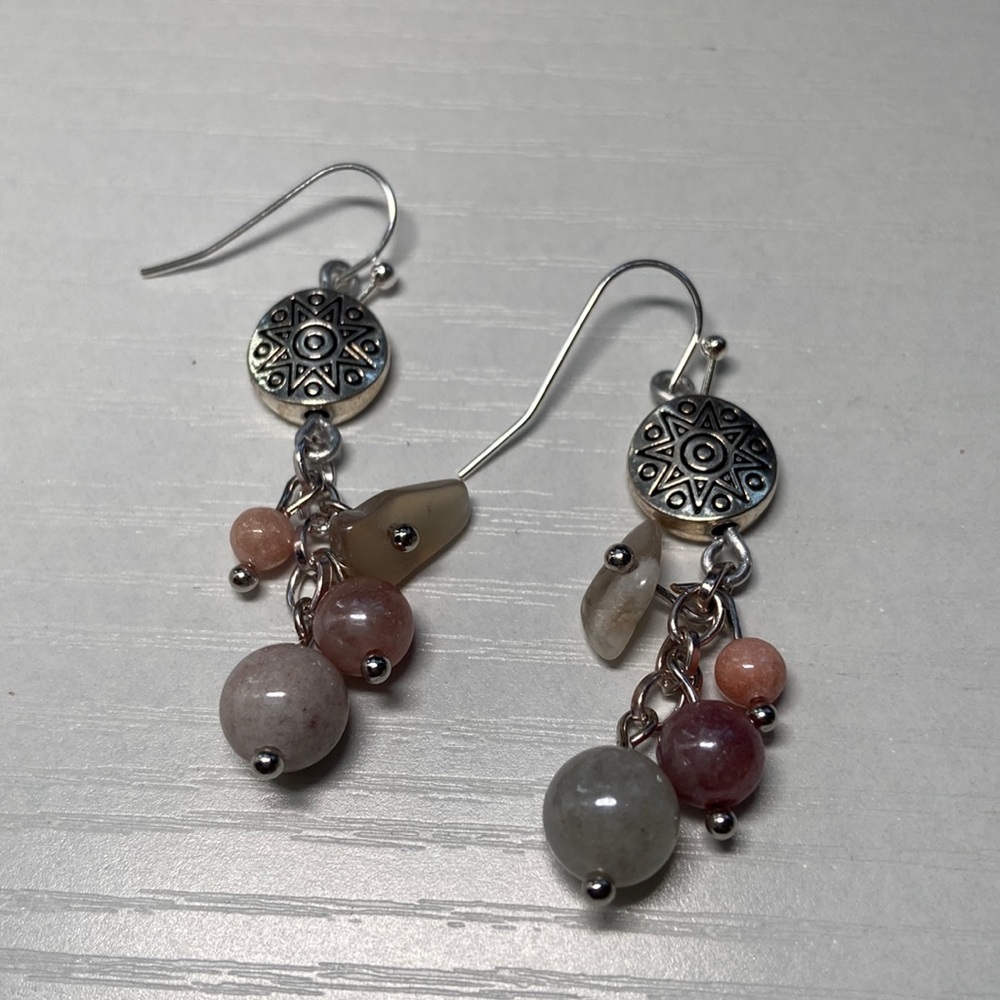 Handmade silver and sun stone earrings.